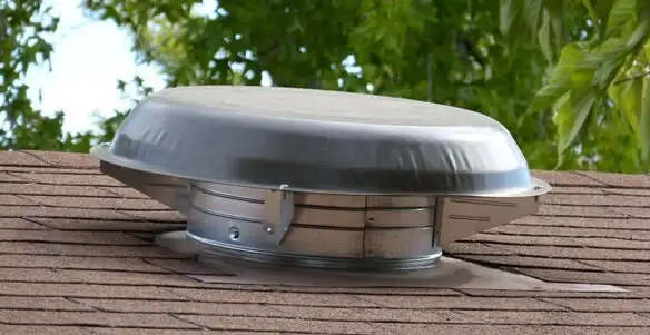attic fan installation services with low-profile roof ventilation unit in Chico, CA