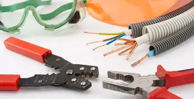 Electrical wiring repair with professional tools and safety equipment in Durham, CA