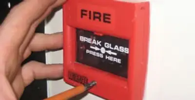 fire alarm installation service showing manual fire alarm pull station installed by licensed electricians in Chico, CA