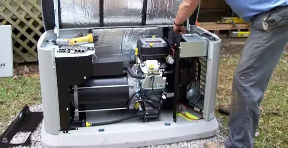 generator installation service showing technician connecting and configuring generator components in Chico, CA