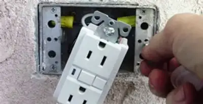 gfci circuits service showing installation of a ground fault circuit interrupter outlet by licensed electricians in Chico, CA