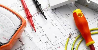licensed electrician planning and testing electrical systems using professional tools in Chico, CA