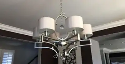 Modern chandelier installation with multiple light fixtures in Chico, CA