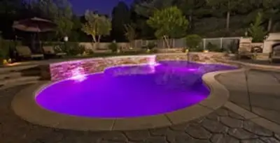pool light installation and repair services illuminating a residential swimming pool in Chico, CA
